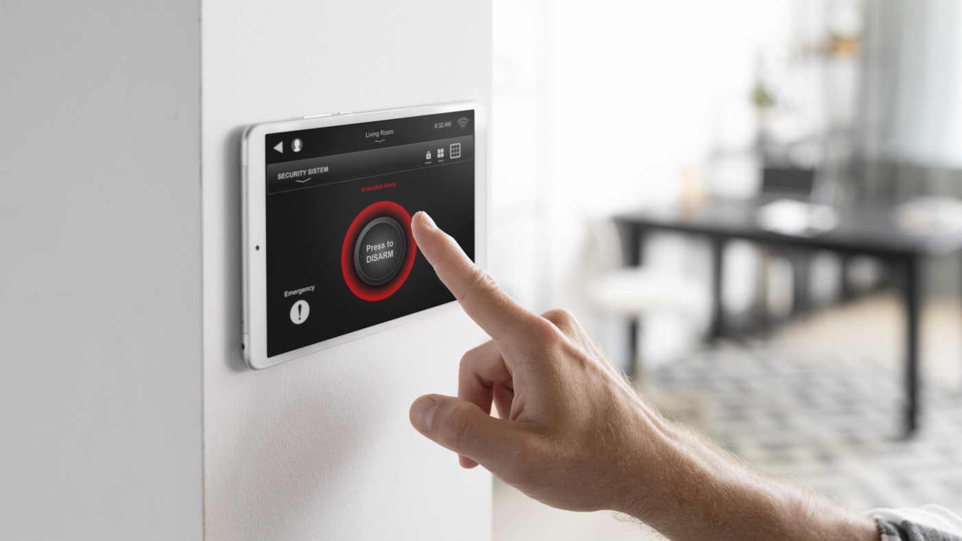 man-using-tablet-his-smart-home